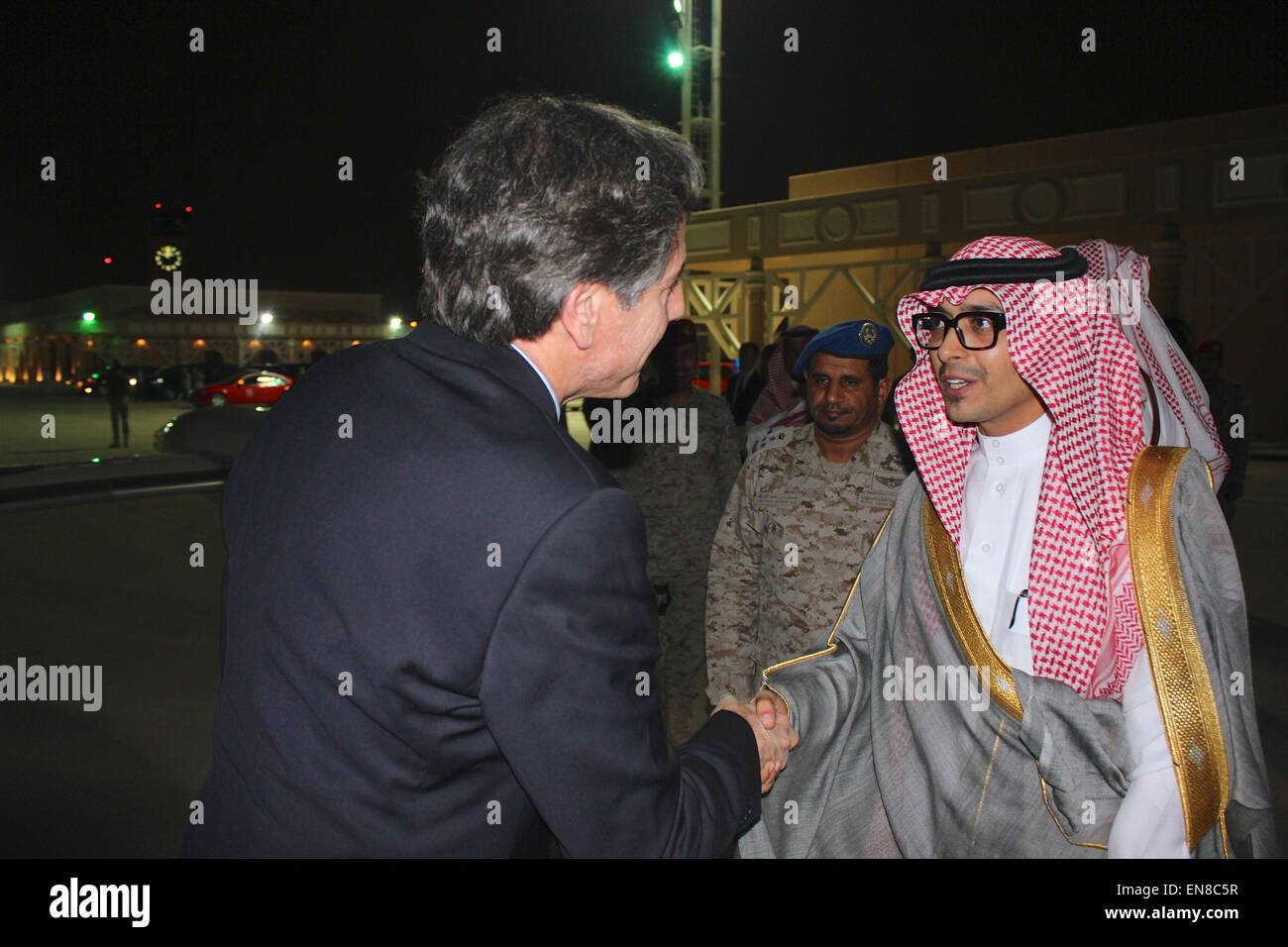 Deputy Secretary of State Tony Blinken is greeted by a member of the Saudi Ministry of Foreign Affairs Protocol Office upon his arrival in Riyadh on April 6, 2015. Stock Photo