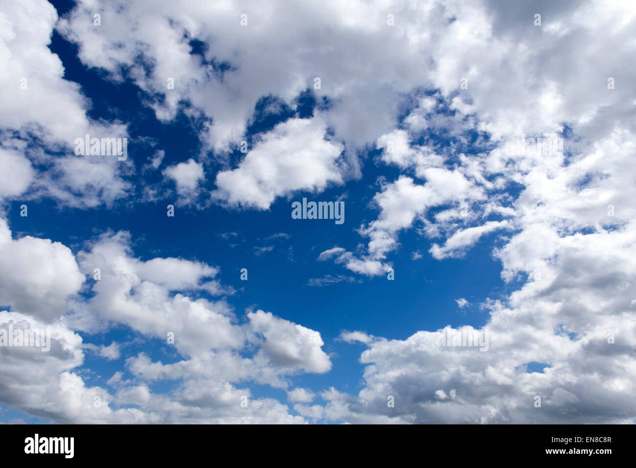 white clouds in a deep blue sky Stock Photo