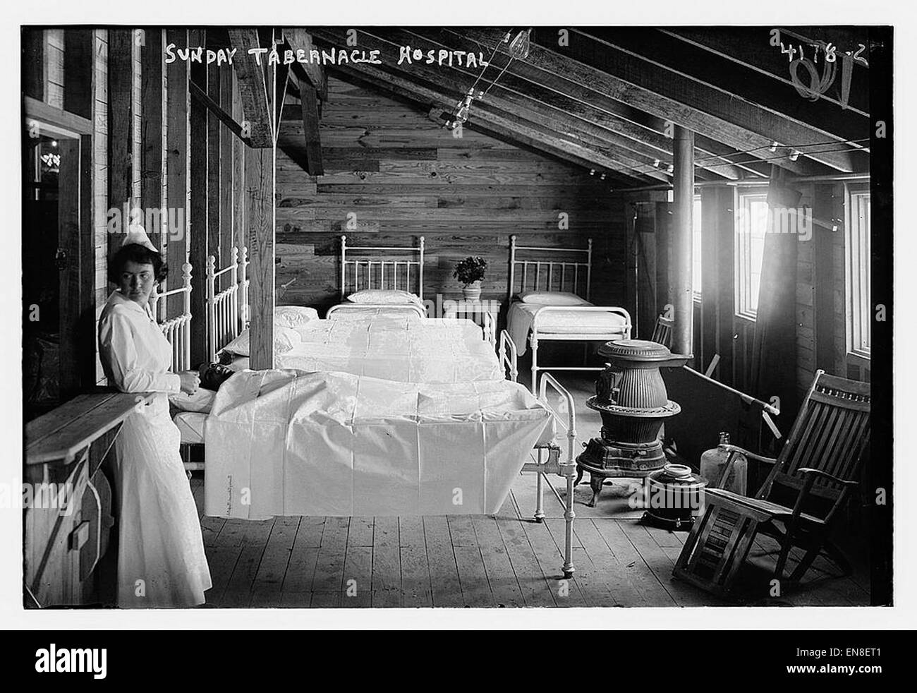 The Sunday Tabernacle Hospital image provides a historical look at a hospital setting during a significant moment in medical or social history. Capturing the environment and people of that era, the image offers valuable insights into medical care and hospital structures from a past era. Stock Photo