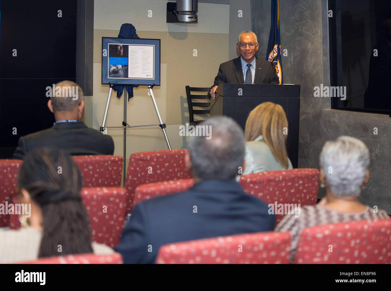 NASA Administrator, Charles Bolden, offers words of appreciation after accepting the gift of a portion of the writings of Dr. Maya Angelou that were flown aboard the Orion spacecraft during EFT-1 in December of 2014 from Dr. Angelou’s family during a ceremony on Monday, April 6, 2015 at NASA Headquarters in Washington, DC. Stock Photo