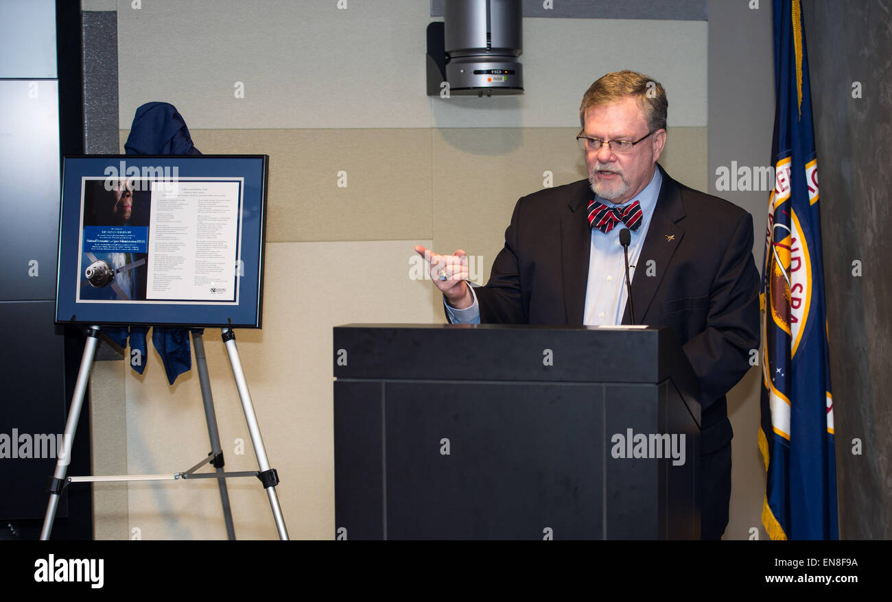 Dr. W. Michael Hawes, vice president, Orion, Lockheed Martin, speaks after accepting the gift of a portion of the writings of Dr. Maya Angelou that were flown aboard the Orion spacecraft during EFT-1 in December of 2014 from Dr. Angelou’s family during a ceremony on Monday, April 6, 2015 at NASA Headquarters in Washington, DC. Stock Photo