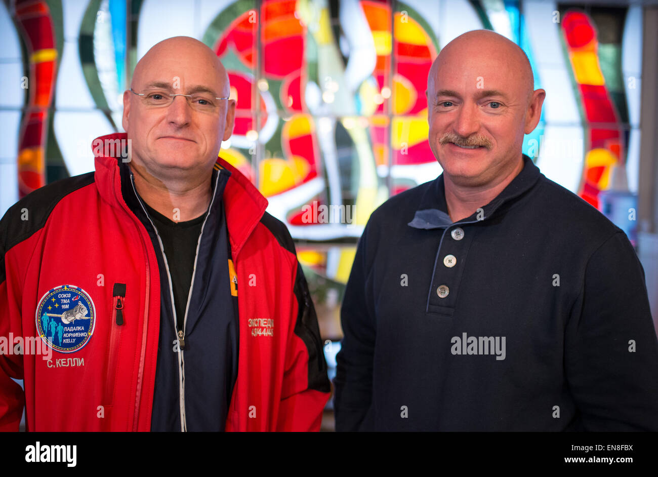 NASA astronaut Scott Kelly and his twin brother Mark Kelly pose before launching to the International Space Station for a one-year mission, along with cosmonauts Mikhail Kornienko and Gennady Padalka, from Baikonur Cosmodrome in Kazakhstan. Stock Photo