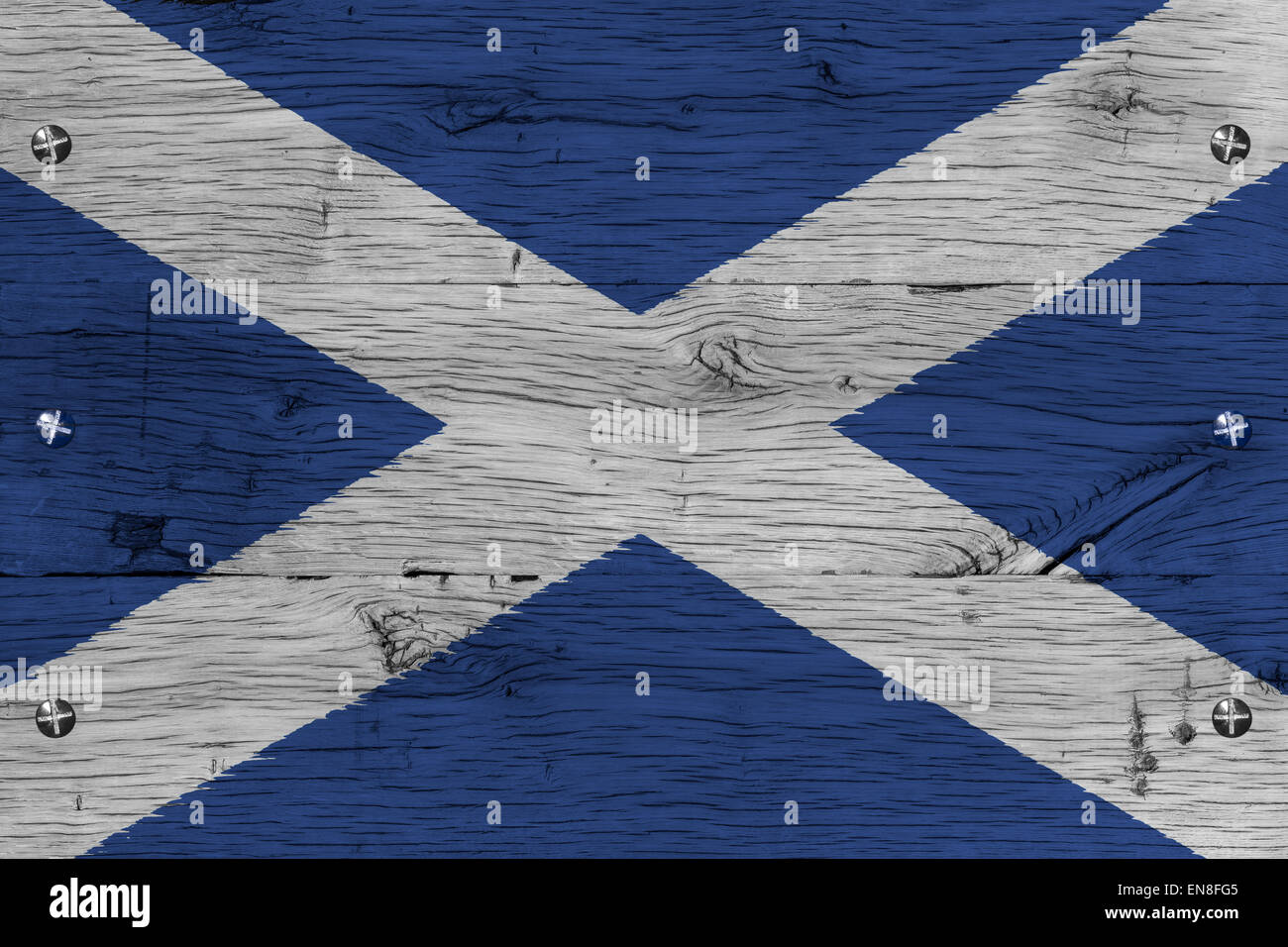 Scotland,  Scottish national flag. Also known as Saint Andrew's Cross of Saltire. Painting is colorful on old oak wood. Fastened Stock Photo