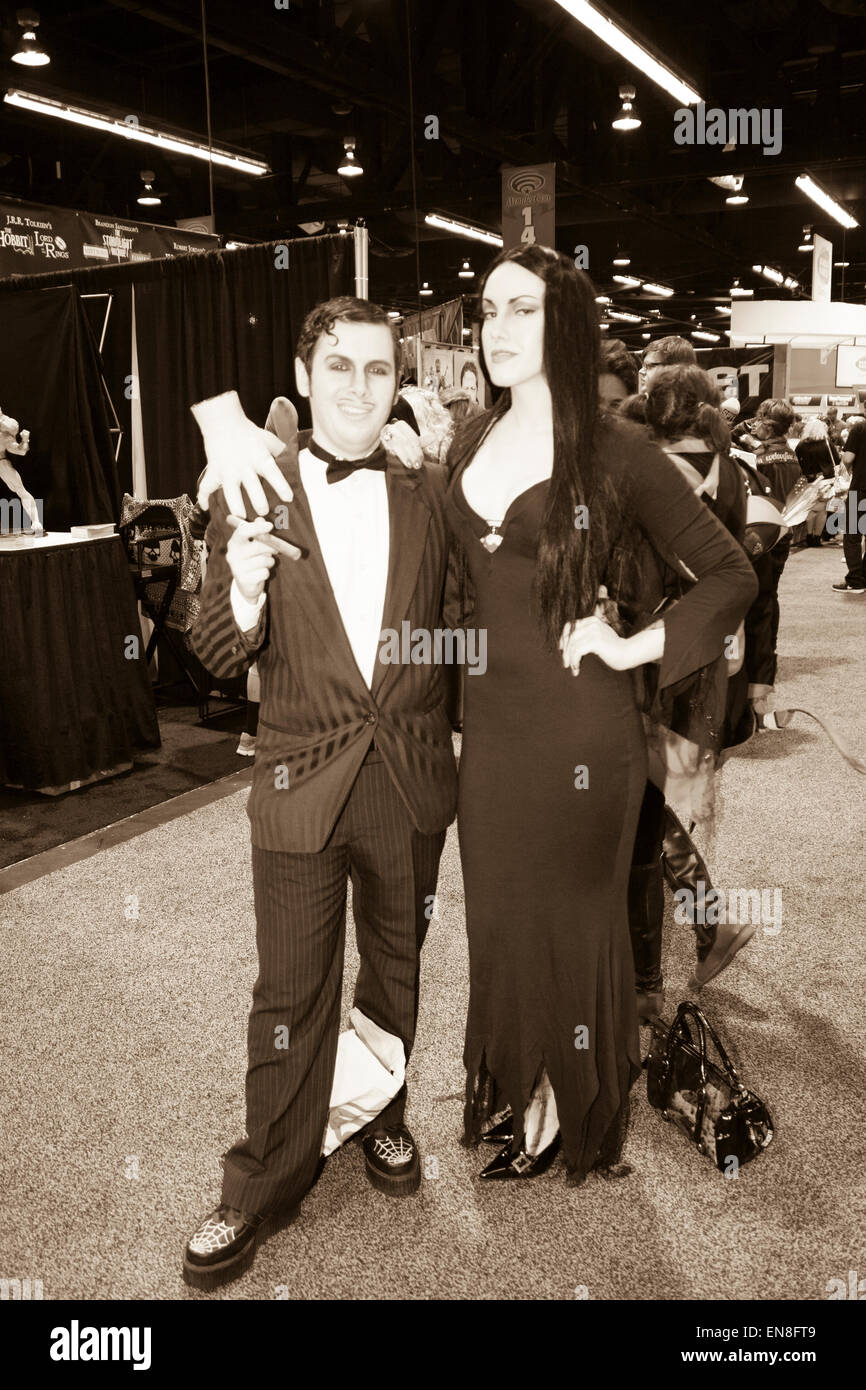 Cosplayers dressed as Morticia and Gomez Addams from the Addams Family TV  show and movies at Wondercon in Anaheim California Stock Photo - Alamy