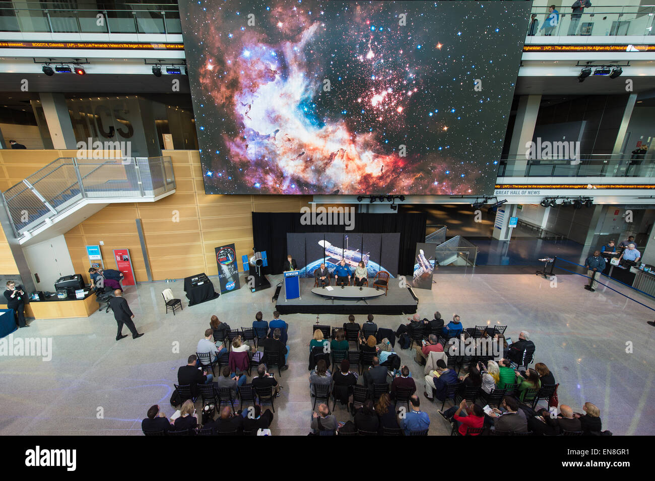 Dr. Kathryn Flanagan, interim director, Space Telescope Science Institute, speaks at the Hubble 25th Anniversary official image debut event on Thursday, April 23, 2015 at the Newseum in Washington, DC. The official image from Hubble's near-infrared Wide Field Camera 3 is of a two million year old cluster of about 3,000 stars called Westerlund 2, named after the astronomer who discovered it in the 1960s. Westerlund 2 is located in the constellation Carina about 20,000 light-years away from Earth. Stock Photo
