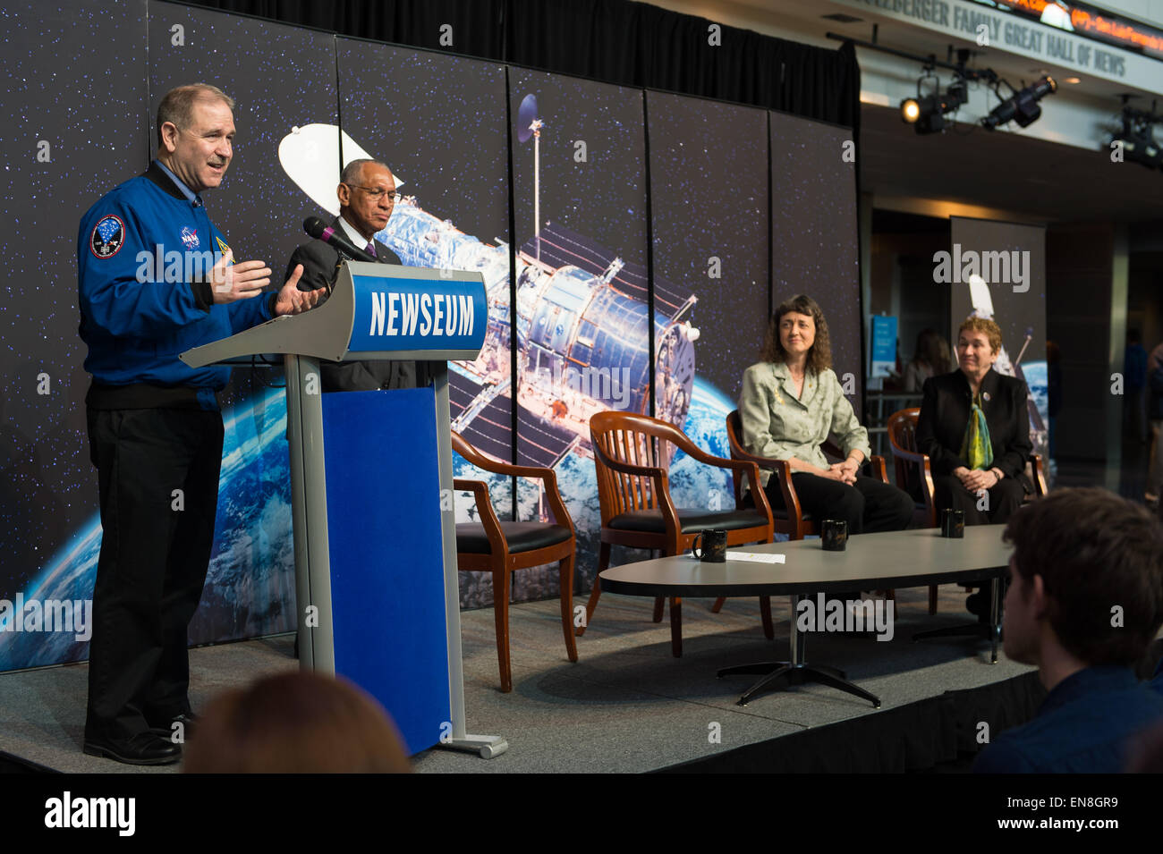John Grunsfeld, associate administrator, Science Mission Directorate, NASA, speaks at the Hubble 25th Anniversary official image debut event on Thursday, April 23, 2015 at the Newseum in Washington, DC. The official image from Hubble's near-infrared Wide Field Camera 3 is of a two million year old cluster of about 3,000 stars called Westerlund 2, named after the astronomer who discovered it in the 1960s. Westerlund 2 is located in the constellation Carina about 20,000 light-years away from Earth. Stock Photo