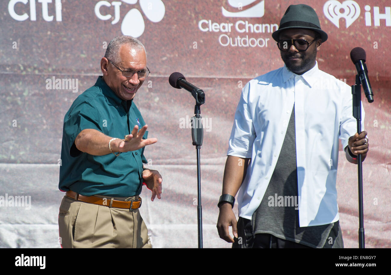 NASA Administrator Charles Bolden, left, is seen on stage with will.i.am during the Global Citizen 2015 Earth Day event on Saturday, April 18, 2015 on the Washington Monument Grounds in Washington, DC. Administrator Bolden and will.i.am highlighted how the agency is using space based sensing to better understand how our planet works, how we affect it, and how it might change in the future. Stock Photo