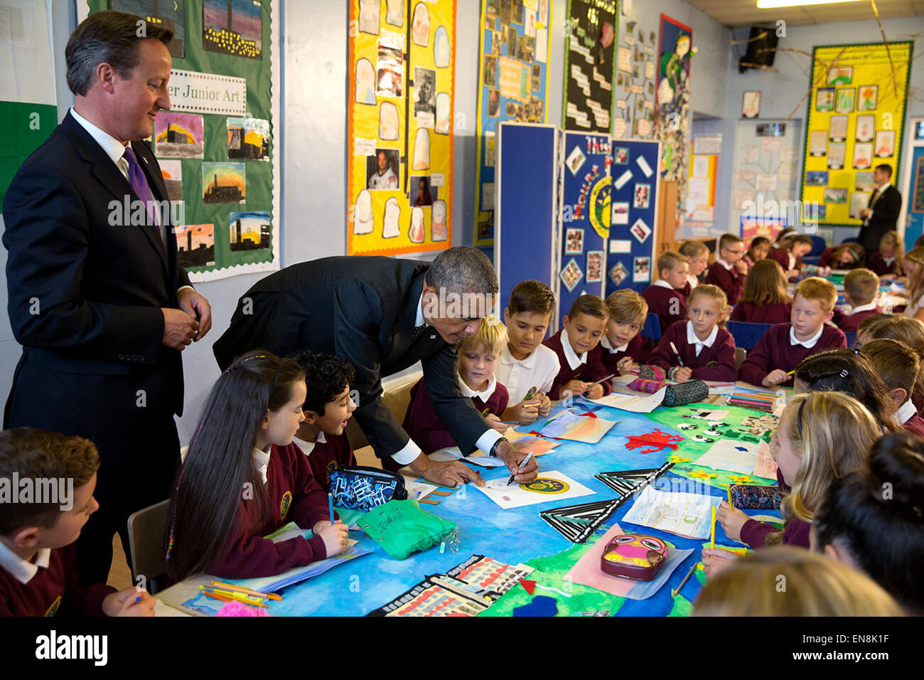 President Barack Obama and Prime Minister David Cameron of the United Kingdom visit with students in a classroom at Mount Pleasant Primary School in Newport, Wales, Sept. 4, 2014. Stock Photo