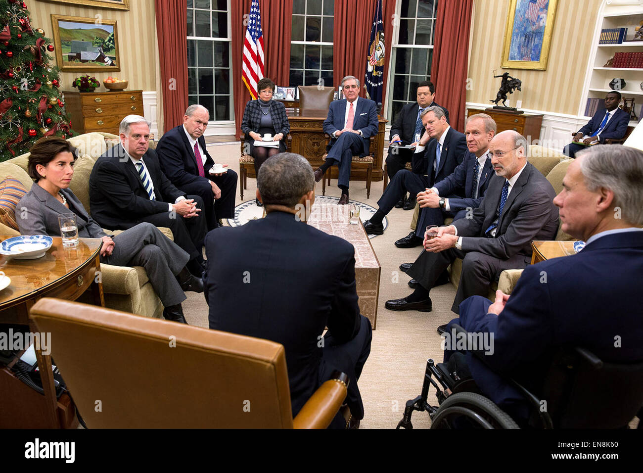President Barack Obama meets with newly elected governors in the Oval Office, Dec. 5, 2014. From left are Rhode Island Governor Gina Raimondo, Maryland Governor Larry Hogan, Alaska Governor Bill Walker, Senior Advisor Valerie Jarrett, Jerry Abramson, Director of Intergovernmental Affairs, Adrian Saenz, Deputy Director of Intergovernmental Affairs, Massachusetts Governor Charlie Baker, Illinois Governor Bruce Rauner, Pennsylvania Governor Tom Wolf and Texas Governor Greg Abbott. Stock Photo
