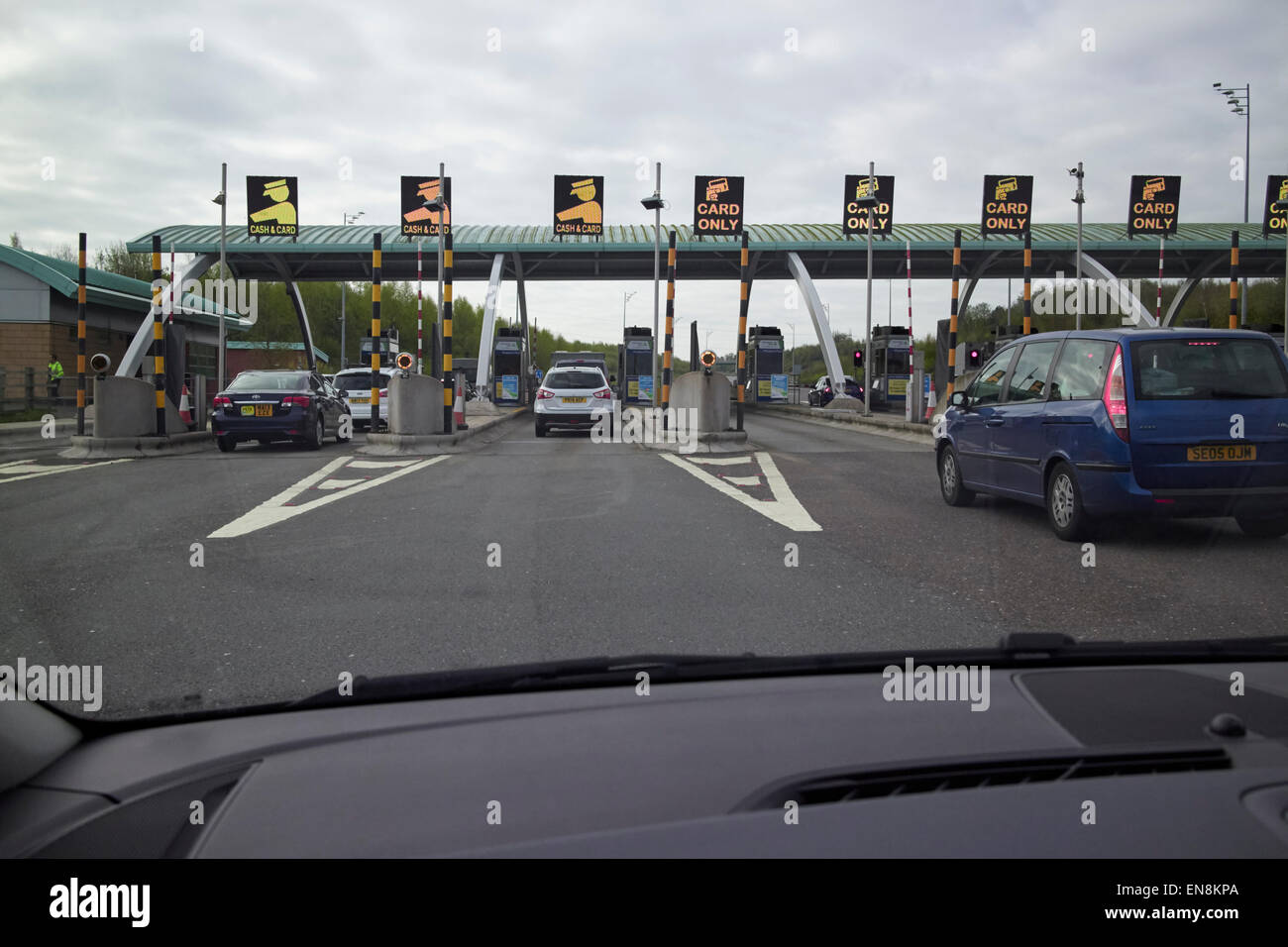 approaching M6 toll road booth plaza motorway england uk Stock Photo