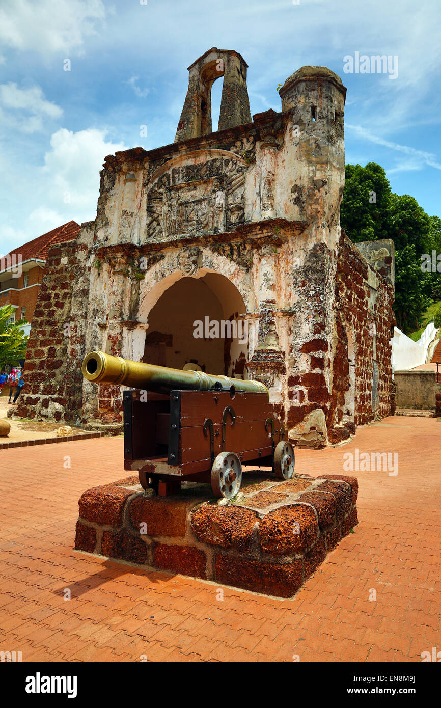 Stone gate, the only surviving part of the A Famosa fort with cannon in Malacca, Malaysia Stock Photo