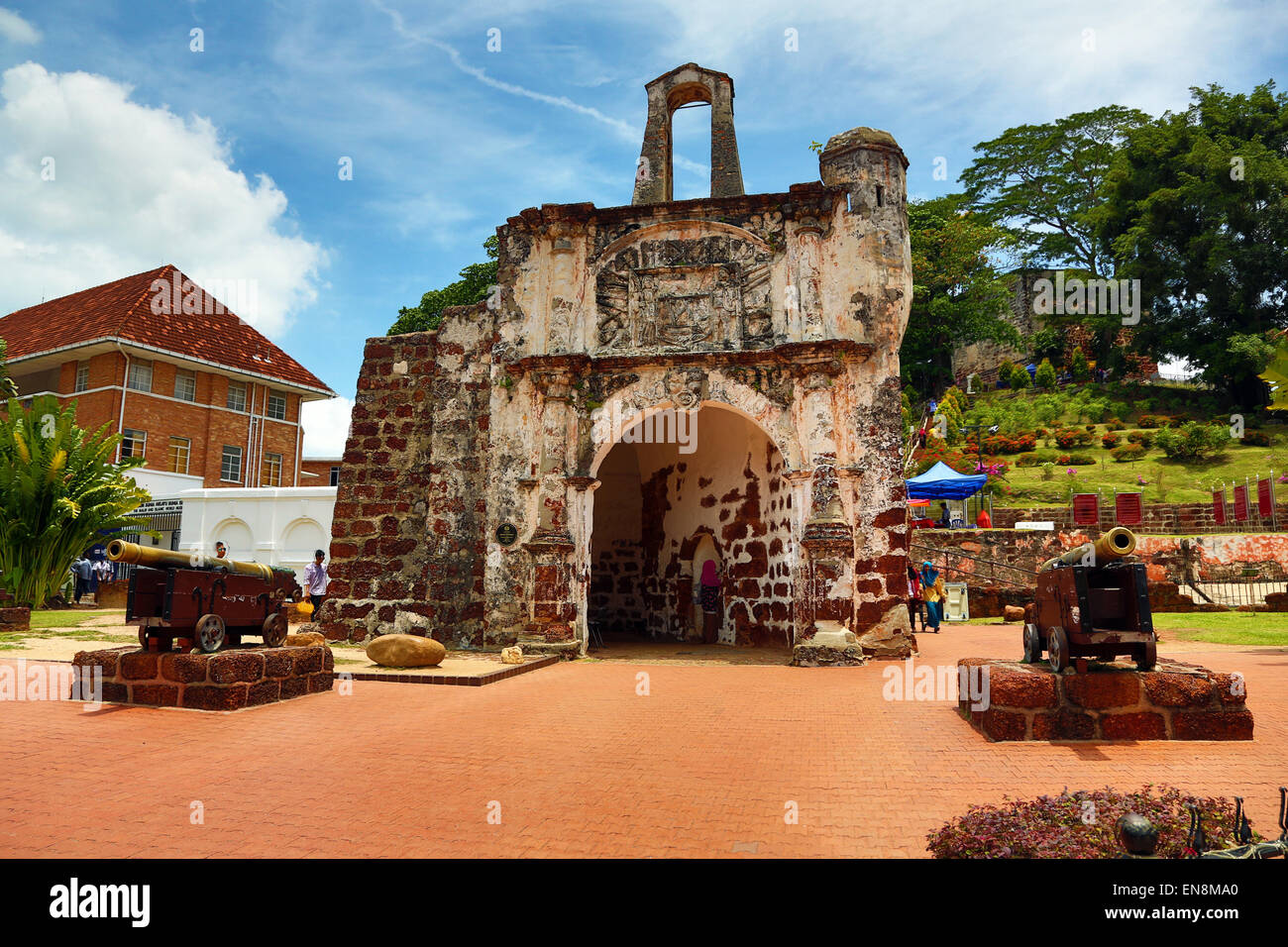 Stone gate, the only surviving part of the A Famosa fort with cannon in Malacca, Malaysia Stock Photo