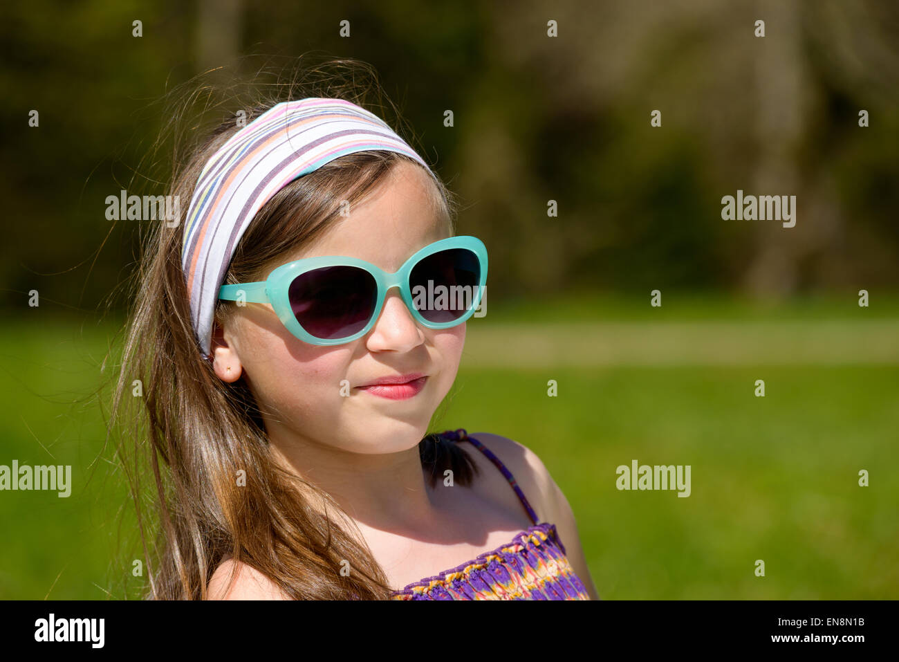 portrait of a pretty young girl with sunglasses Stock Photo Alamy