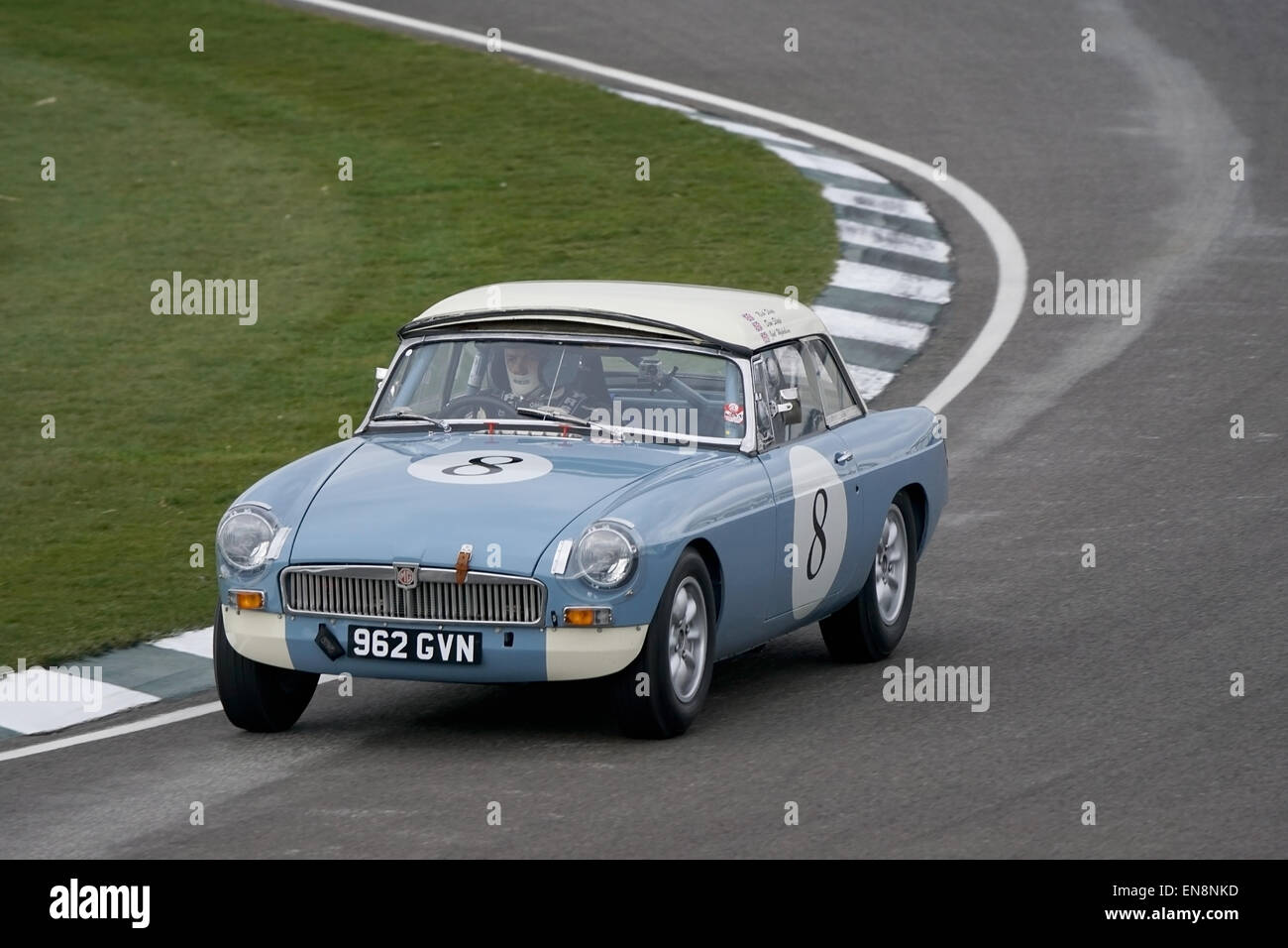 Nicholas Sleep 1964 MGB cornering hard at Woodcote during the Les Leston Cup race at the Goodwood 73rd Members Meeting Stock Photo