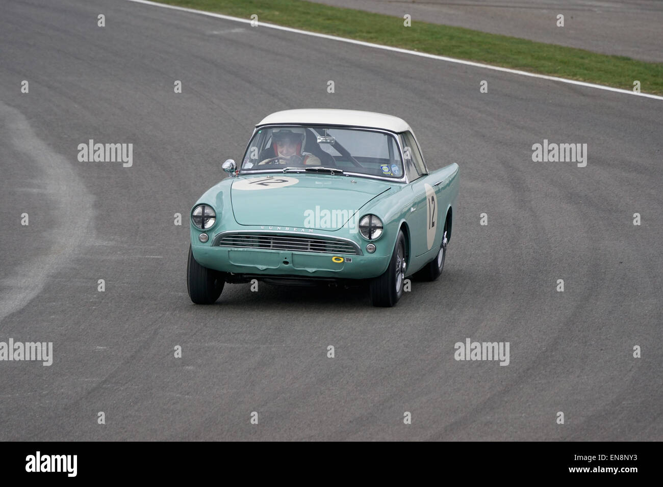 Michael Peet 1961 Sunbeam Alpine cornering hard at Woodcote during the Les Leston Cup race at the Goodwood 73rd Members Meeting Stock Photo