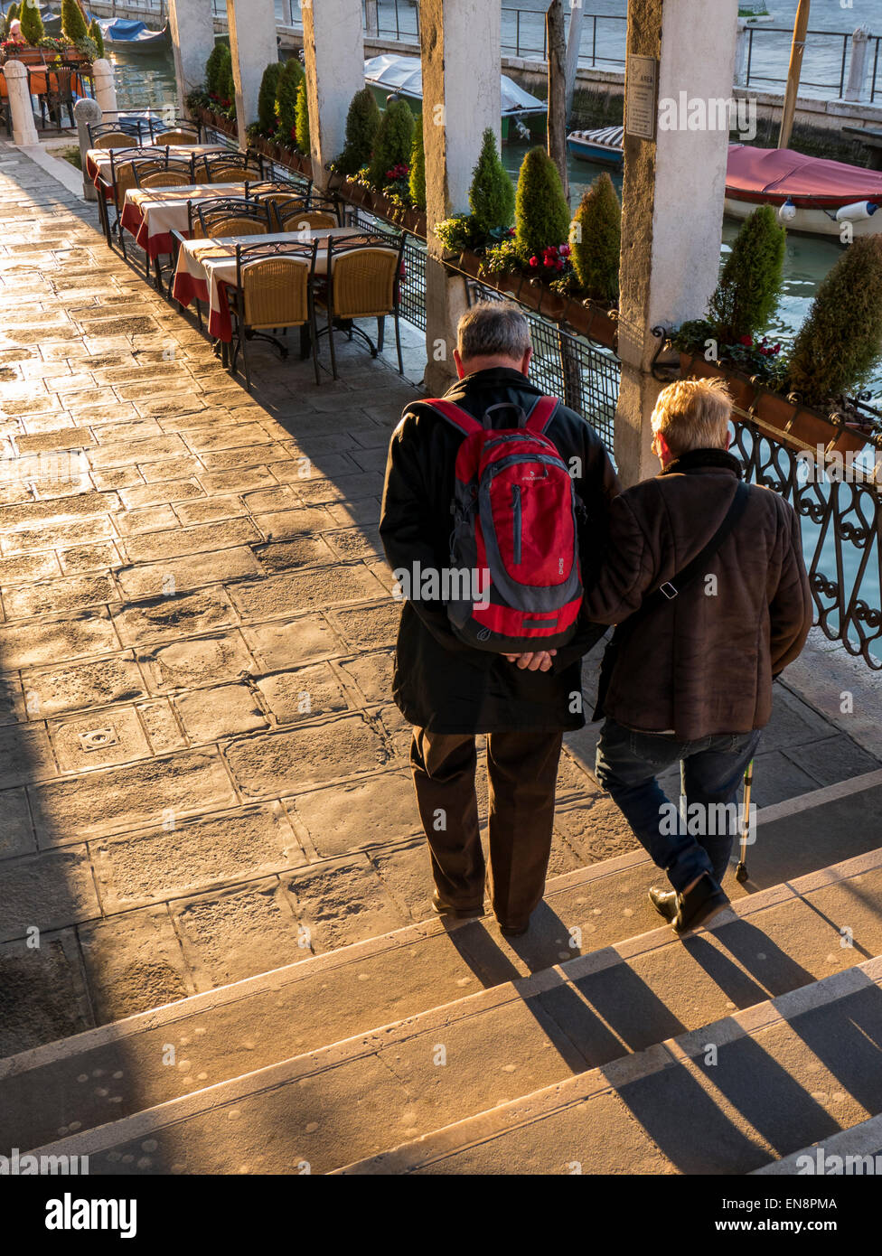 Tourists & locals walking cobblestone paths, Venice, Italy, City of Canals Stock Photo