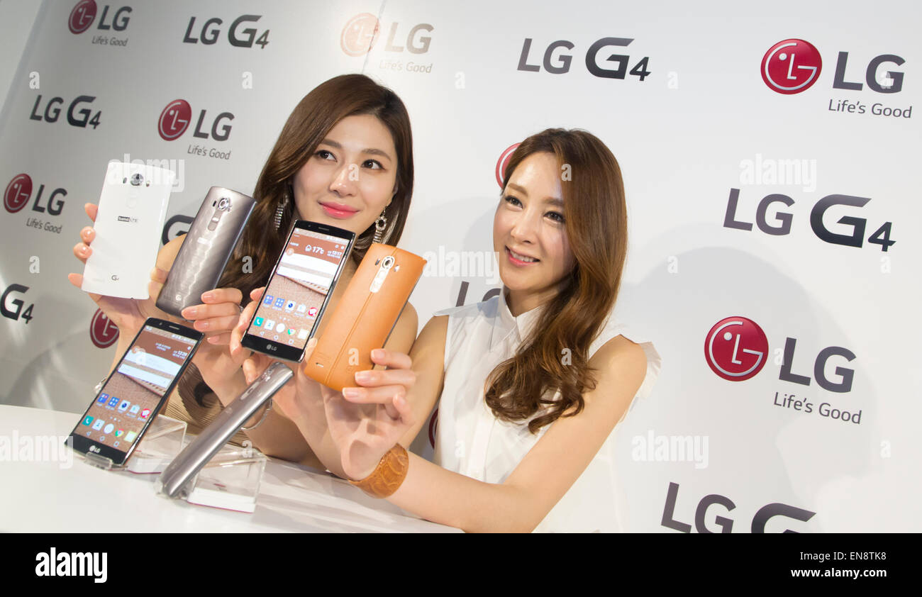 Seoul, South Korea. 29th April, 2015. Models pose to promote LG Electronics' G4 smartphones in Seoul, South Korea. LG showcased its new G4 on Wednesday, that is equipped with 5.5-inch in-plane switching (IPS) QHD display, a Qualcomm Snapdragon 808 Processor with X10 LTE and a F 1.8 camera lens. The new smartphone runs on Google's Android 5.1 Lollipop and its local price is about US$770, according to local media. Credit:  Lee Jae-Won/AFLO/Alamy Live News Stock Photo