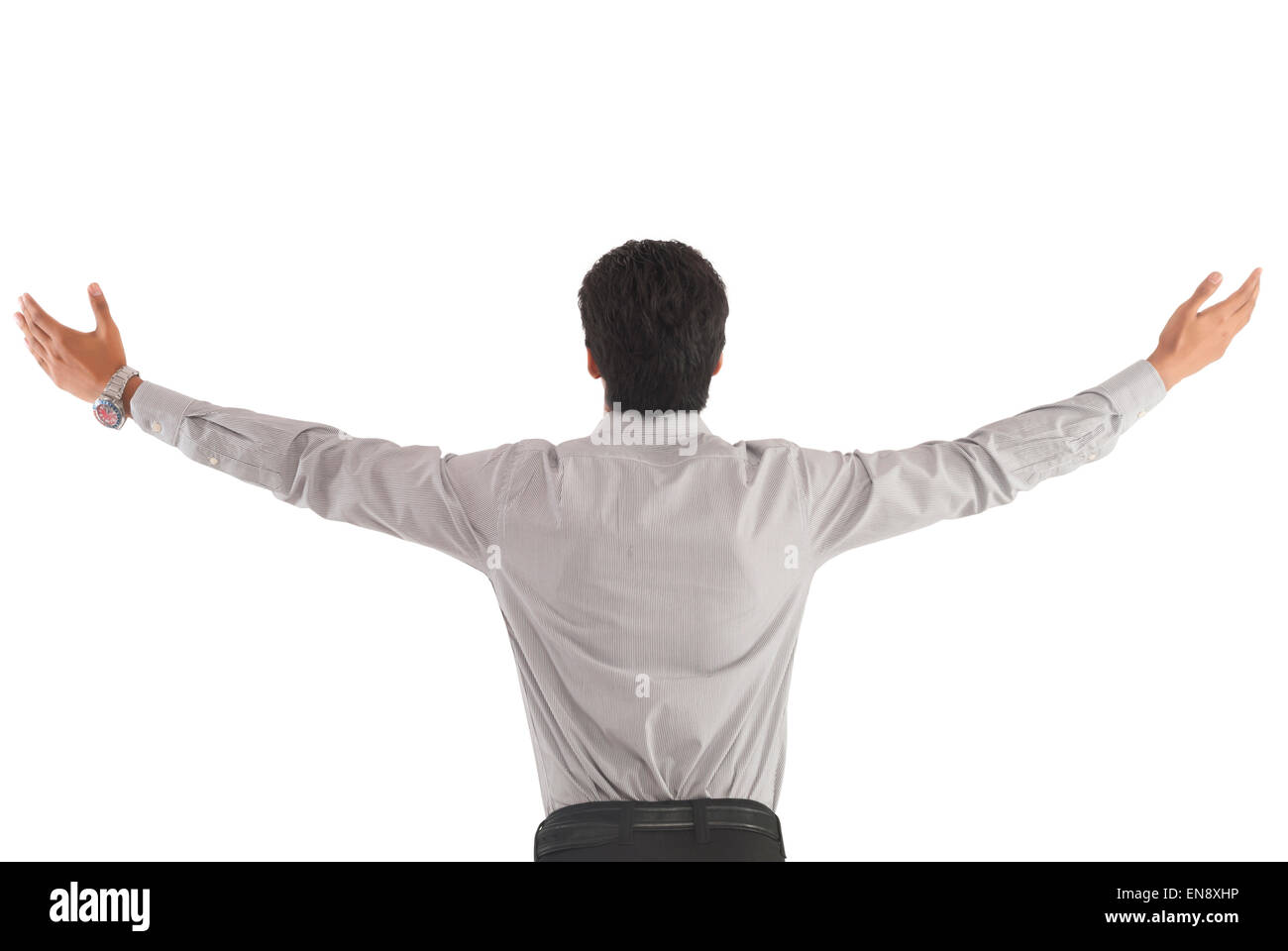 One businessman standing with her arms wide open,facing back Stock
