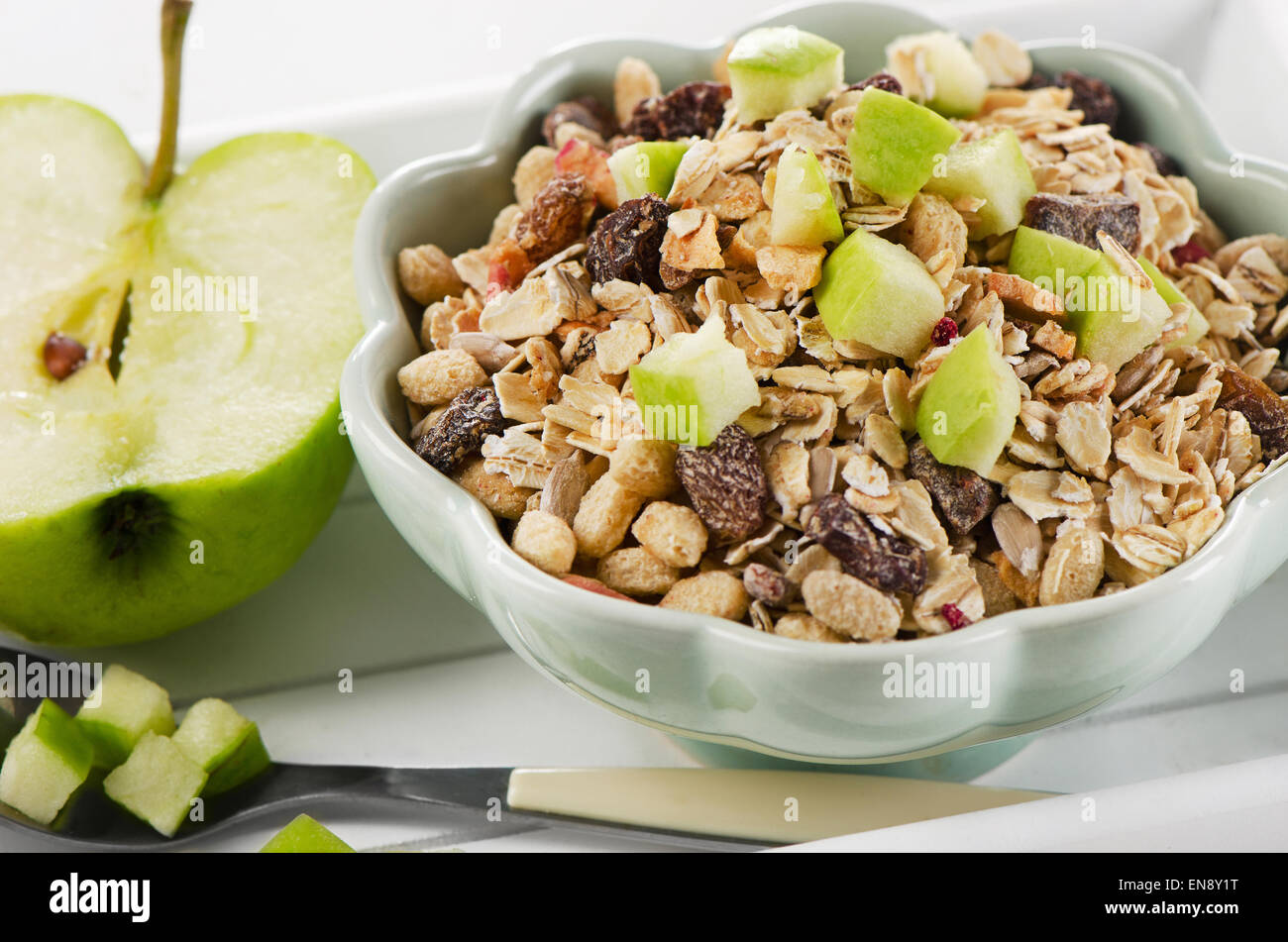 Healthy bowl of muesli, green apple for a nealthy breakfast Stock Photo