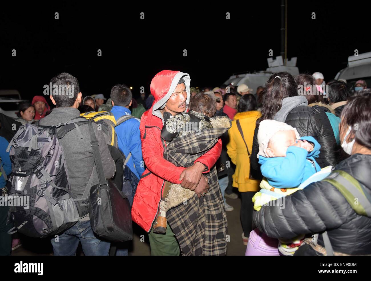 Lhaze, China's Tibet Autonomous Region. 30th Apr, 2015. People evacuated from Zham Town arrive at a temporary settlement in Lhaze County of Xigaze City, southwest China's Tibet Autonomous Region, April 30, 2015. Nearly 1,000 displaced residents from Zham Town in Nyalam County arrived at the resettlement in Lhatze County, some 300 kilometers away from Zham, in army trucks, private cars and taxis Thursday morning. © Xue Yubin/Xinhua/Alamy Live News Stock Photo