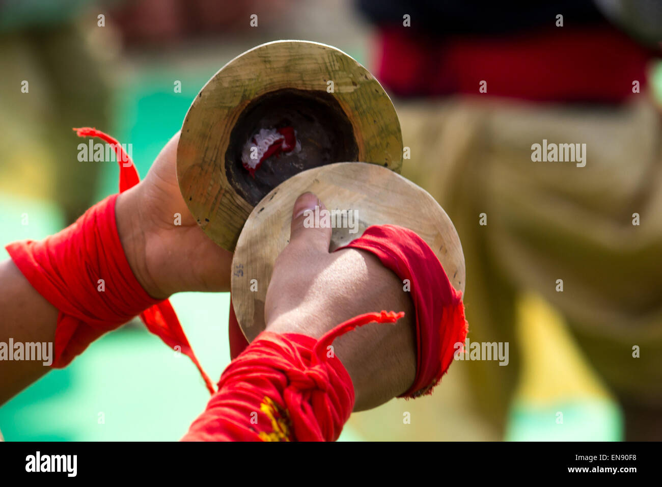 Sivasagar, Assam, India. 30th Apr, 2015. An Indian youth plays a pair