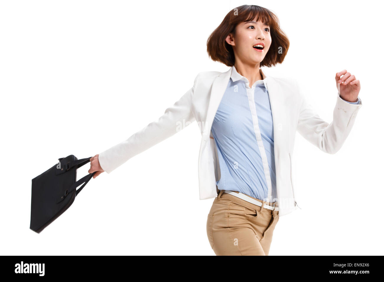 Young female white-collar workers with a briefcase Stock Photo