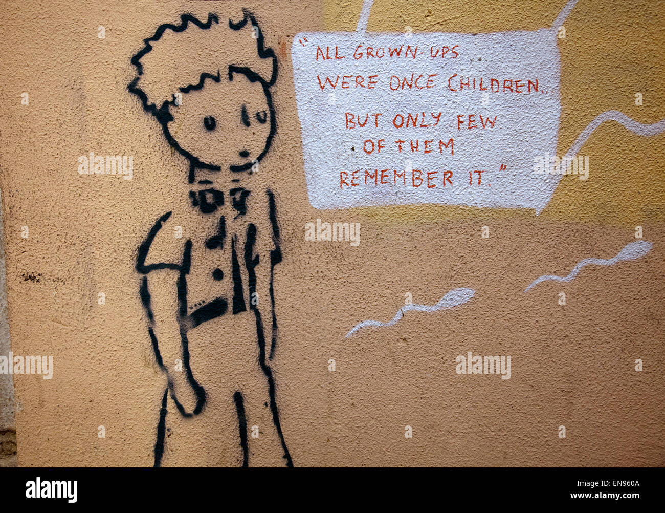 All Grown Ups Were Once Children Graffiti in Bairro Alto - Lisbon - Portugal Stock Photo