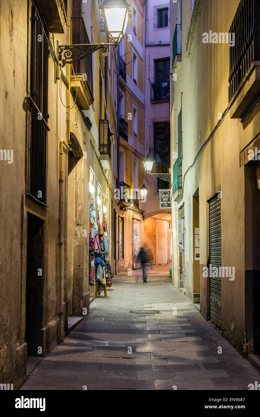 Night view of a narrow street in the medieval district of Barrio Gotico or Barri Gotic, Barcelona, Catalonia, Spain Stock Photo