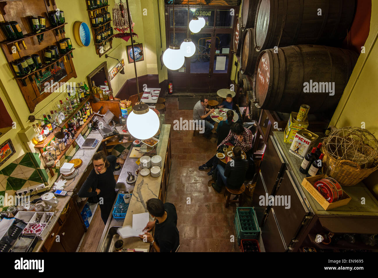 Typical old Spanish bodega bar with wooden barrels in Barrio Gotico or Barri Gotic district, Barcelona, Catalonia, Spain Stock Photo