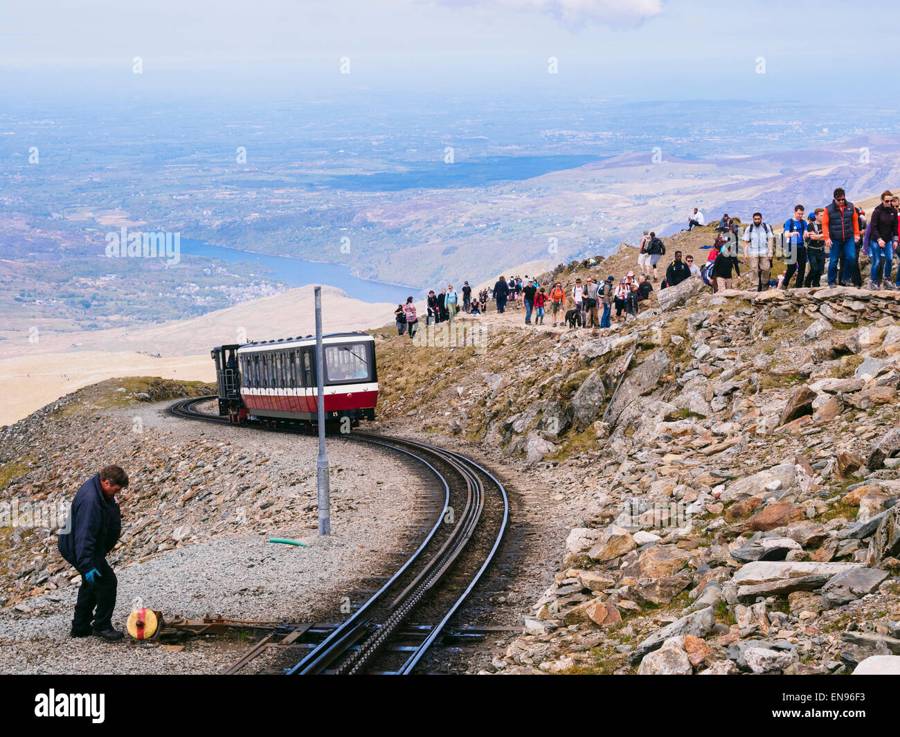 Snowdon railway train leaving summit for Llanberis busy with people