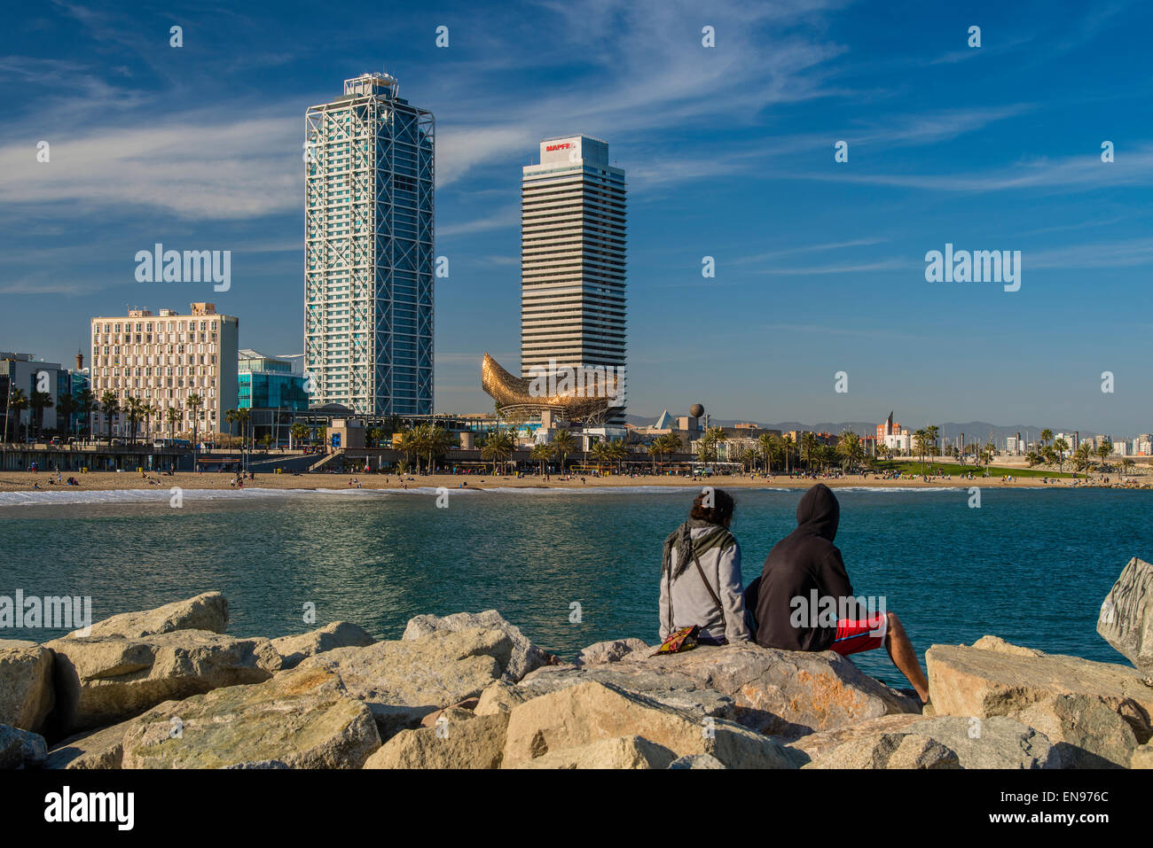 Urban beach with Hotel Arts and Frank Gehry’s Barcelona Fish sculpture, Barcelona, Catalonia, Spain Stock Photo