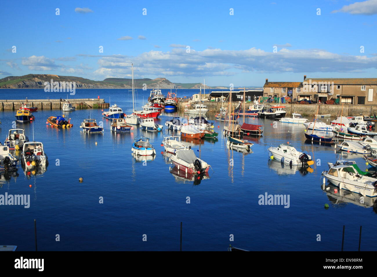 Lyme Regis harbour view looking towards Charmouth, Dorset, England, UK Stock Photo