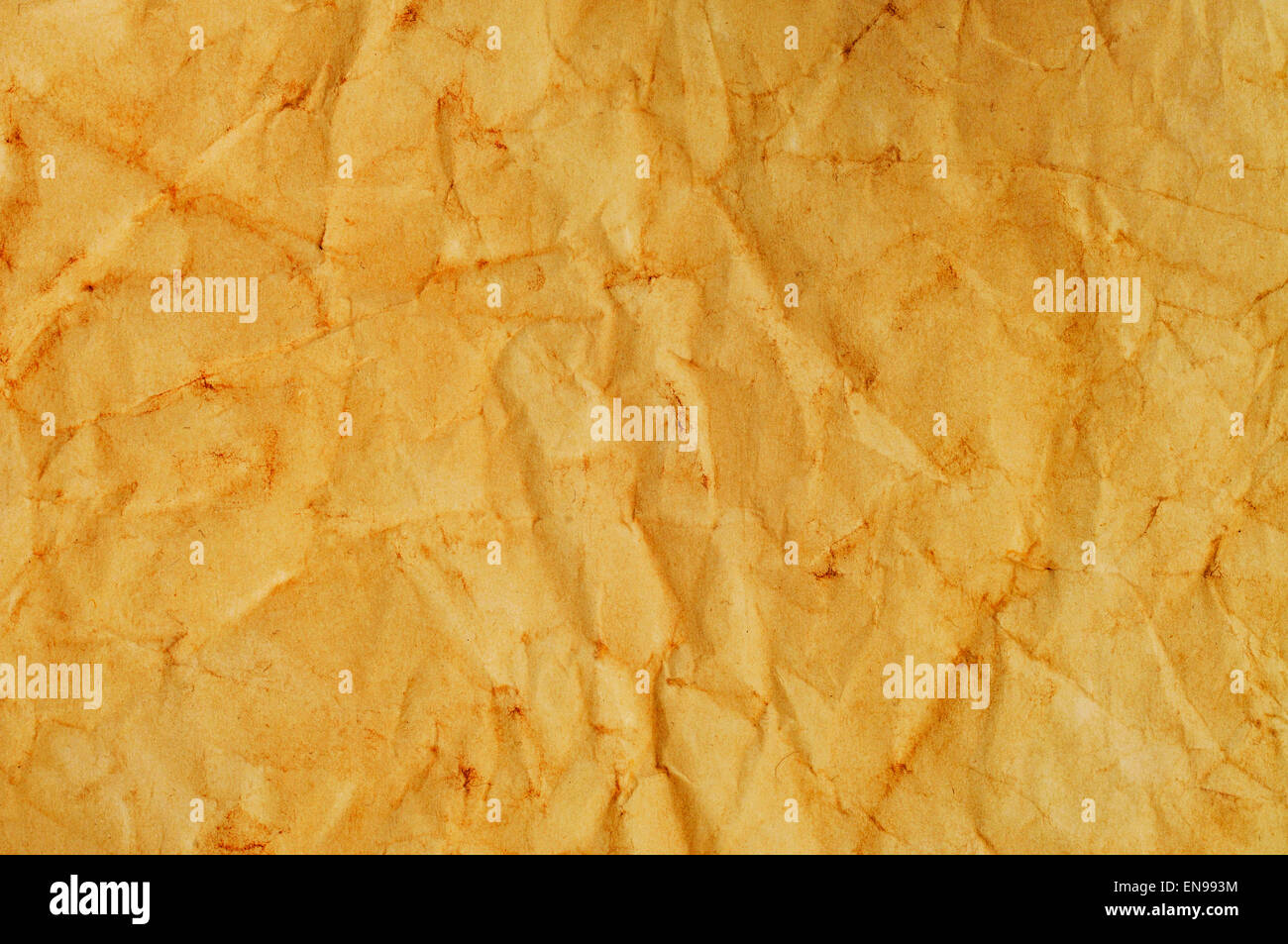 closeup of a yellowish and crumpled blank old paper Stock Photo