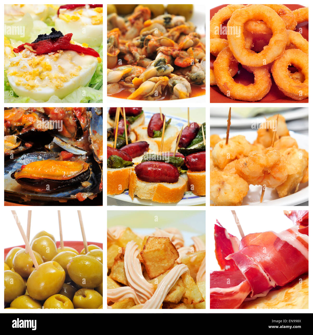 a collage of nine pictures of different spanish tapas, such as calamares a la romana (squid rings), mejillones a la marinera (mu Stock Photo
