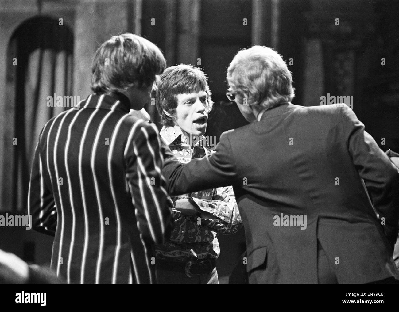 Mick Jagger talking to The Rolling Stones manager Andrew Loog Oldham  (right) after refusing to go on a revolving stage at The London Palladium  Show. 22nd January 1967 Stock Photo - Alamy