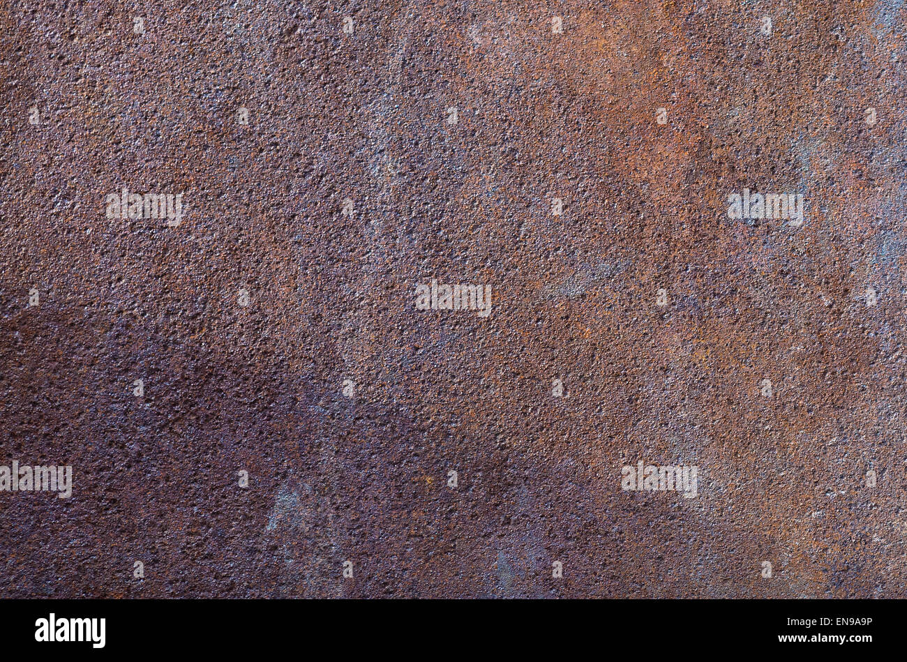 Old rusty rough metal texture. Abstract granular background. Stock Photo