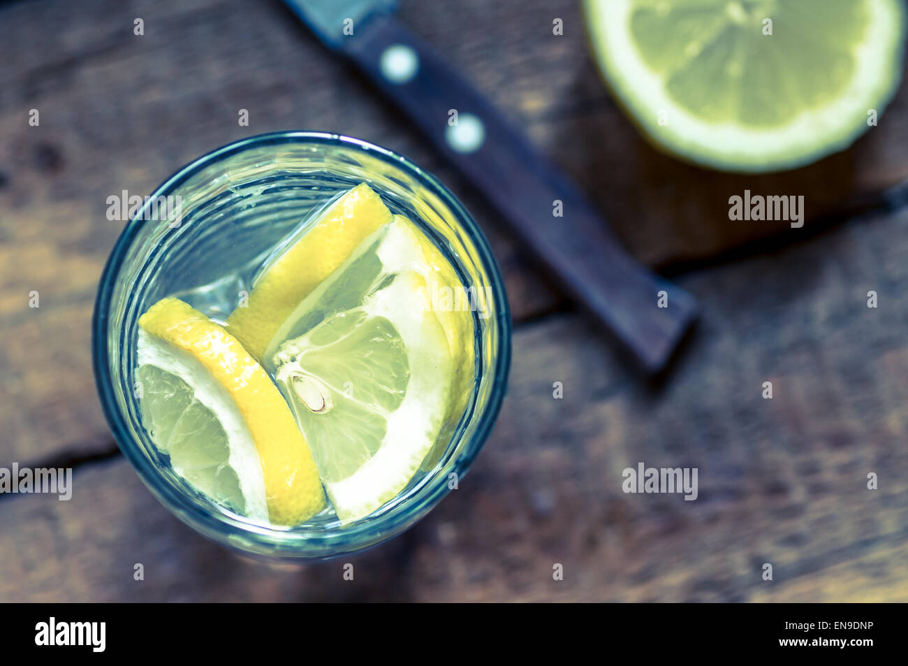 Water with lemon in a glass top view Stock Photo Alamy