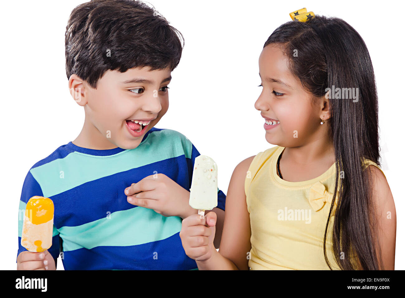 2 indian kids friends greed Ice Cream Stock Photo