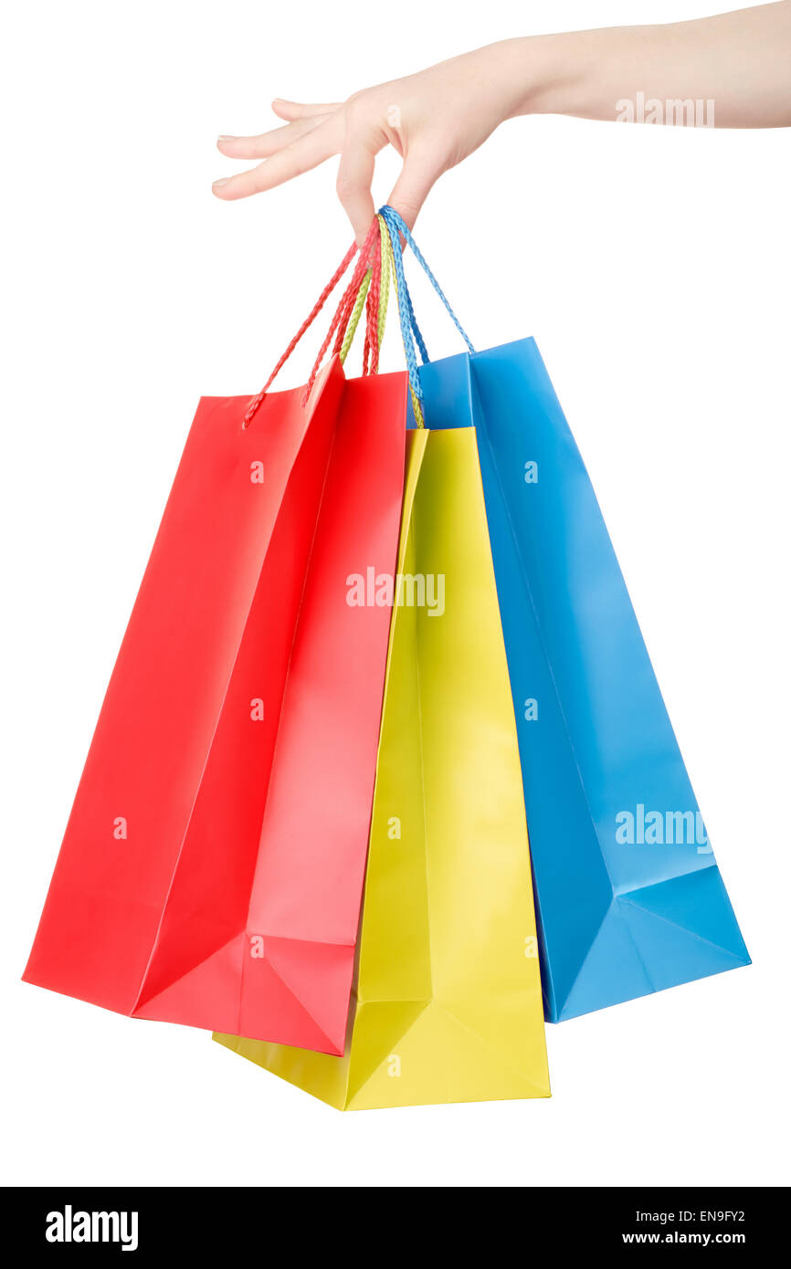 Woman hand holding colorful shopping bags Stock Photo
