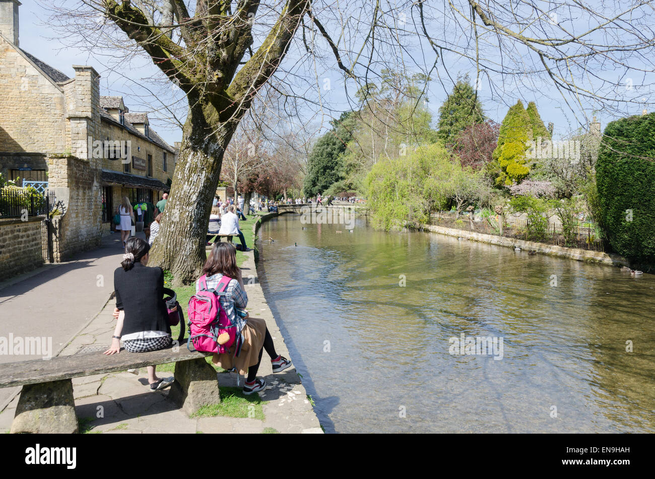 The River Windrush flowing through the centre of Bourton-on-the-Water in the Cotswolds Stock Photo