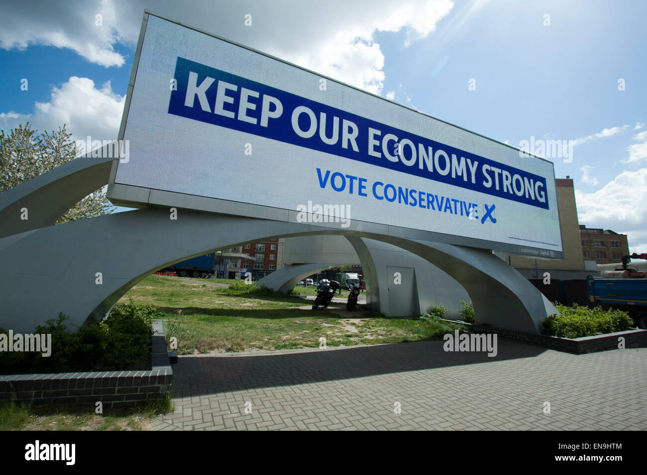 London UK. 30th April 2015. A general election campaign poster for the Conservative party appears on a giant billboard in Southwest London with one week to go until the British voters go to the polls. Credit:  amer ghazzal/Alamy Live News Stock Photo