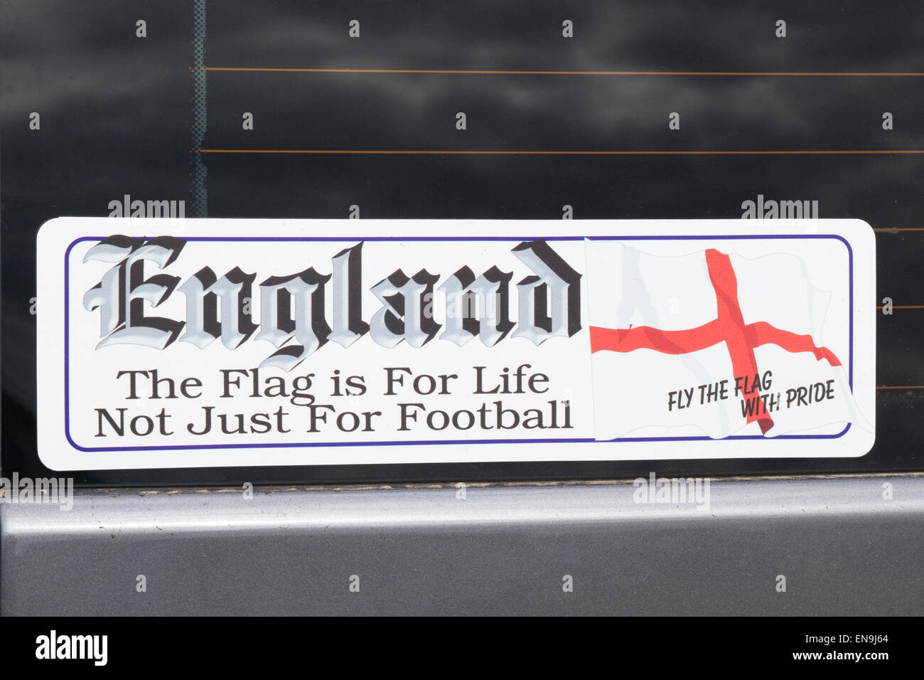 Stickers on a Volkswagen Camper van England 'The Flag is for life not just for Football' Stock Photo