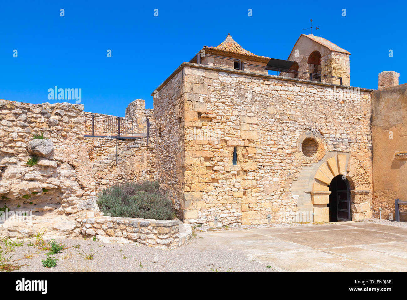 Medieval stone castle facade, main landmark of Calafell town, Spain Stock Photo