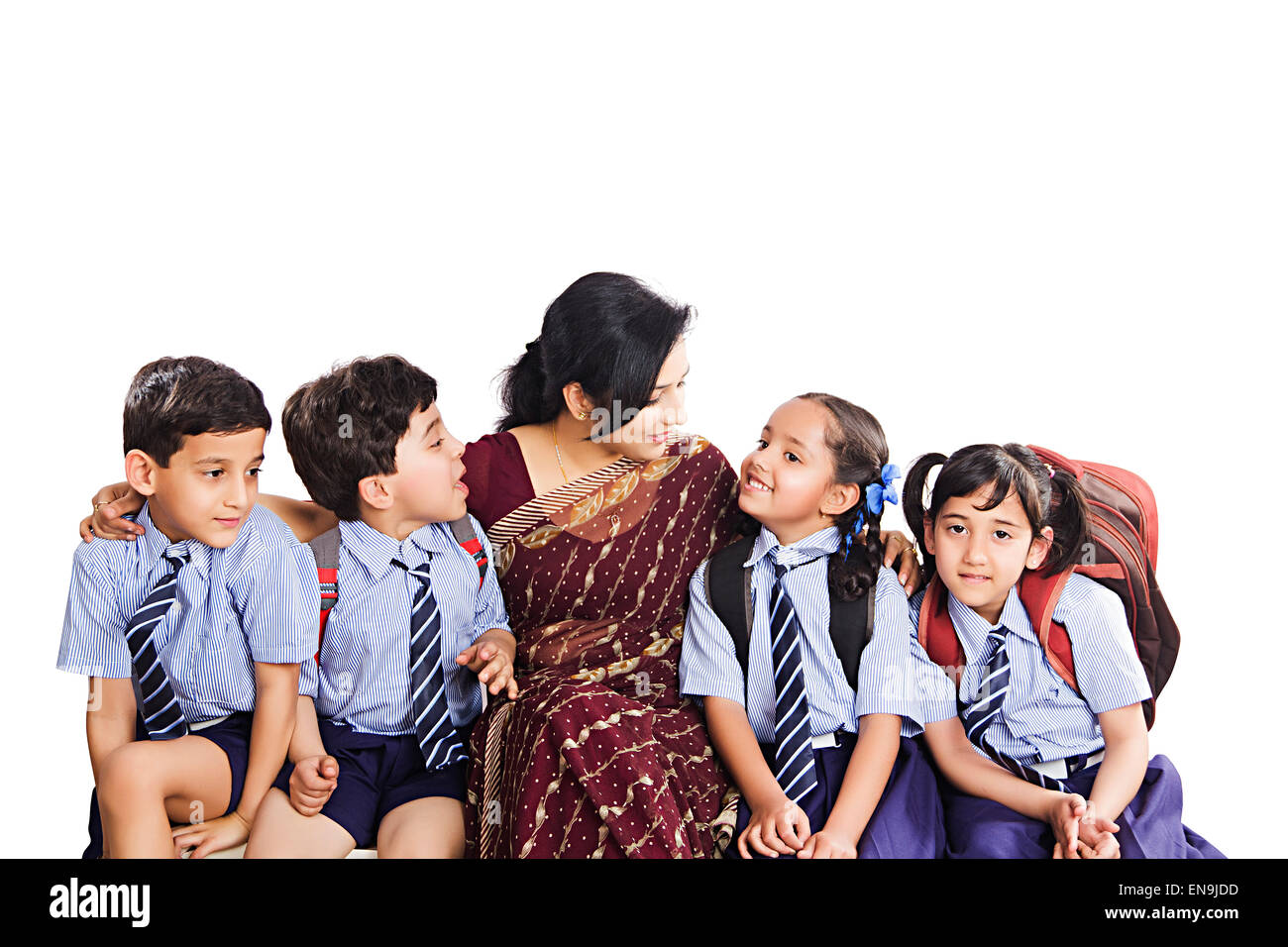 Kids sitting around teacher hi-res stock photography and images - Alamy