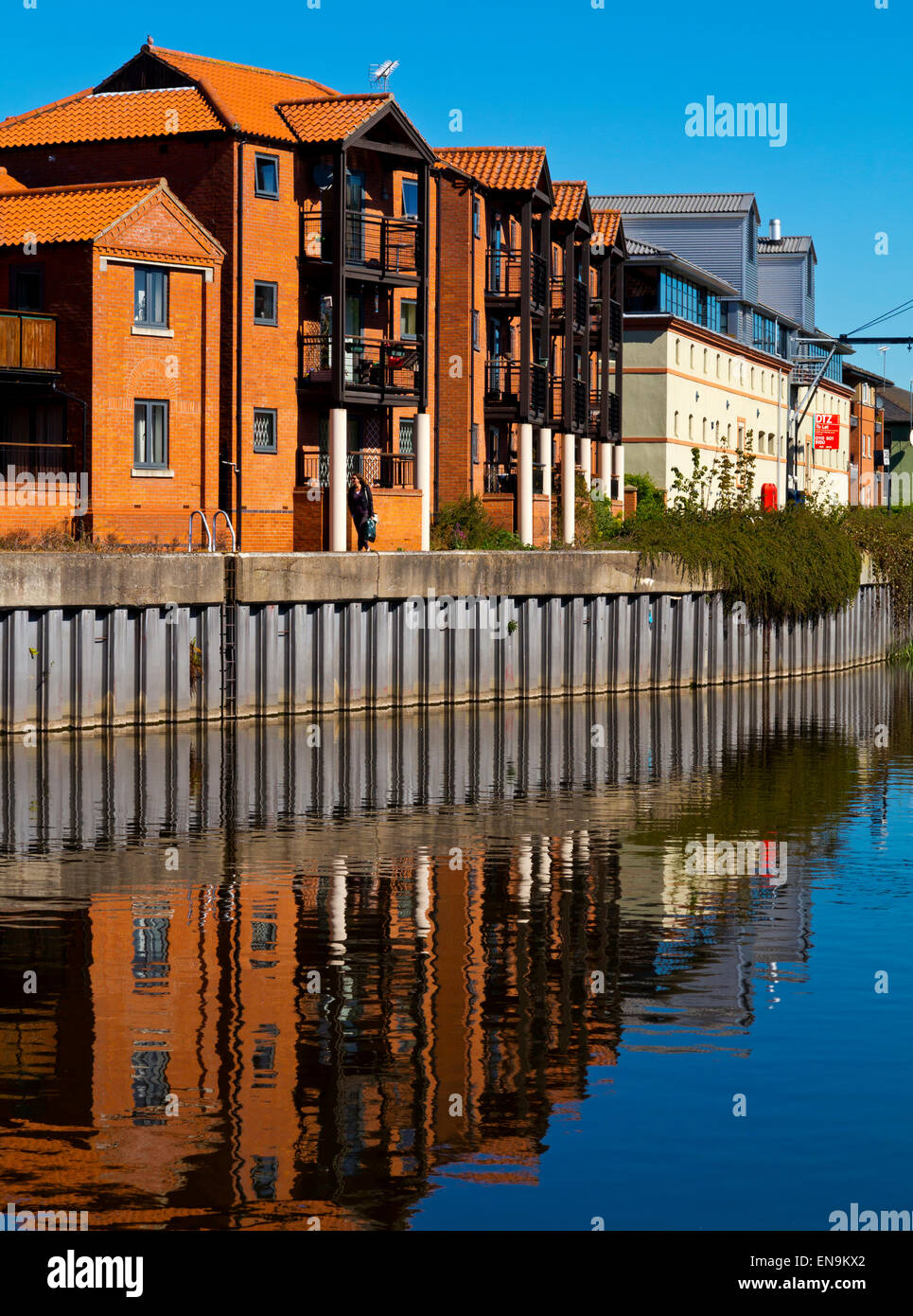Buildings reflected in the River Trent at Newark on Trent a town in