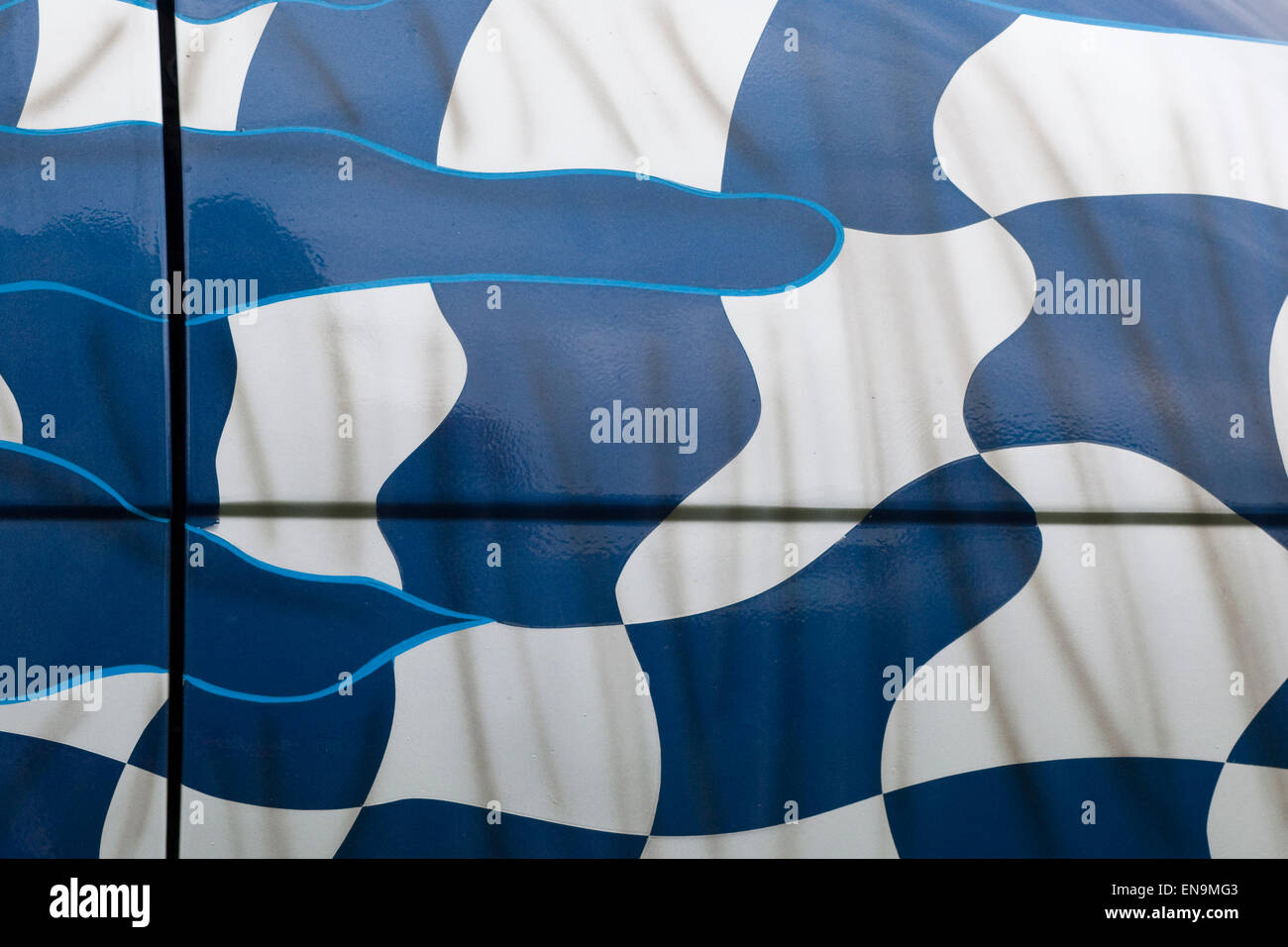 Blue and white Patterns Spray Painted  on a Volkswagen Camper Van Stock Photo