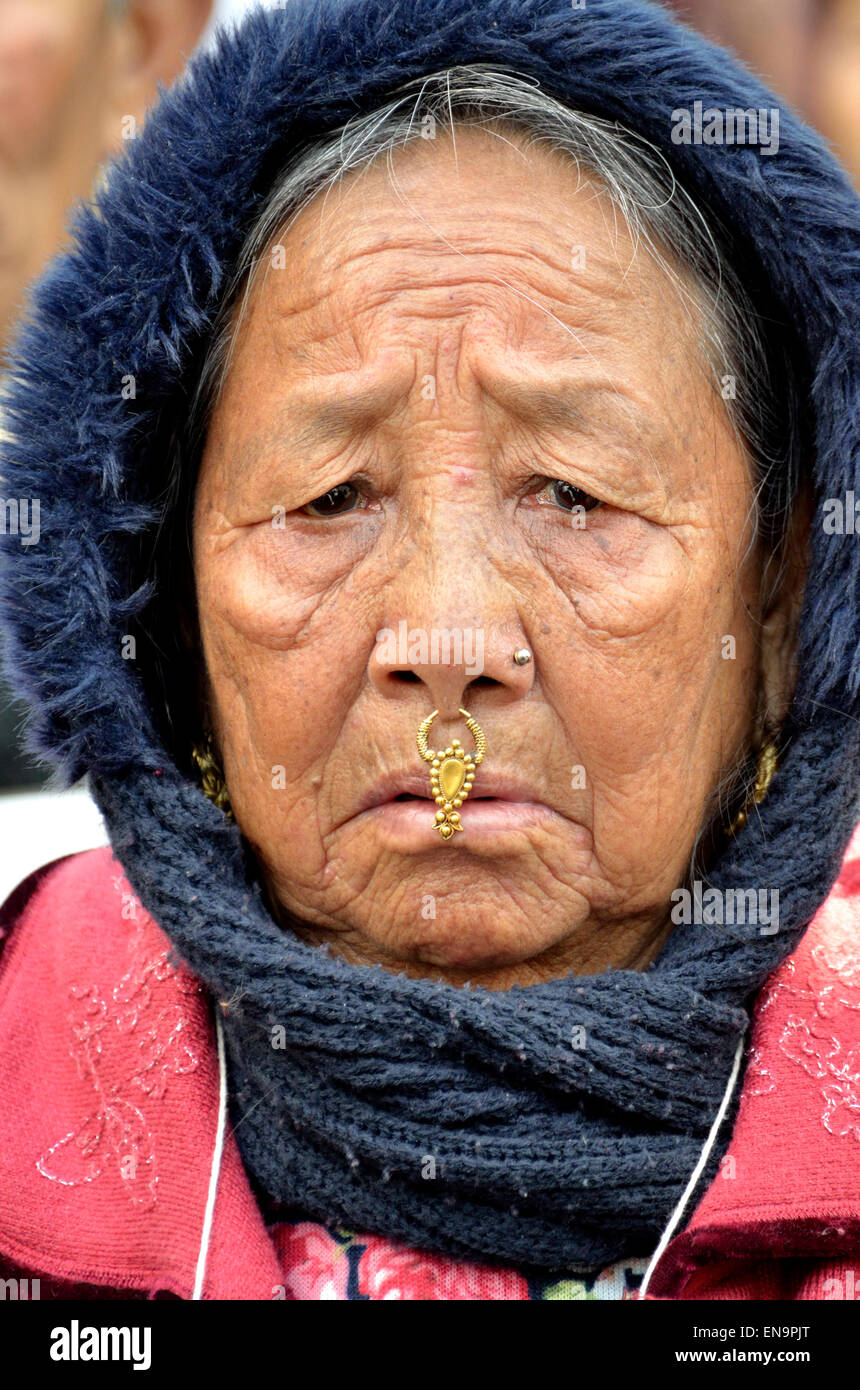 London, England, UK. Elderly Nepalese woman wearing a nose stud (phuli) and hanging  nose ornament (bulaki Stock Photo - Alamy