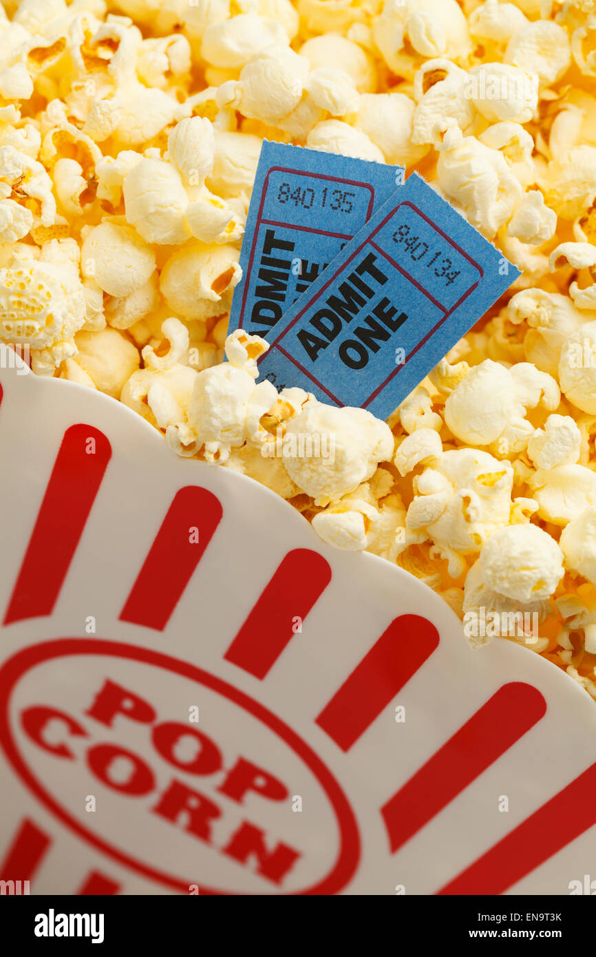 Box of Butter Popcorn with Two Blue Movie Tickets Stock Photo Alamy
