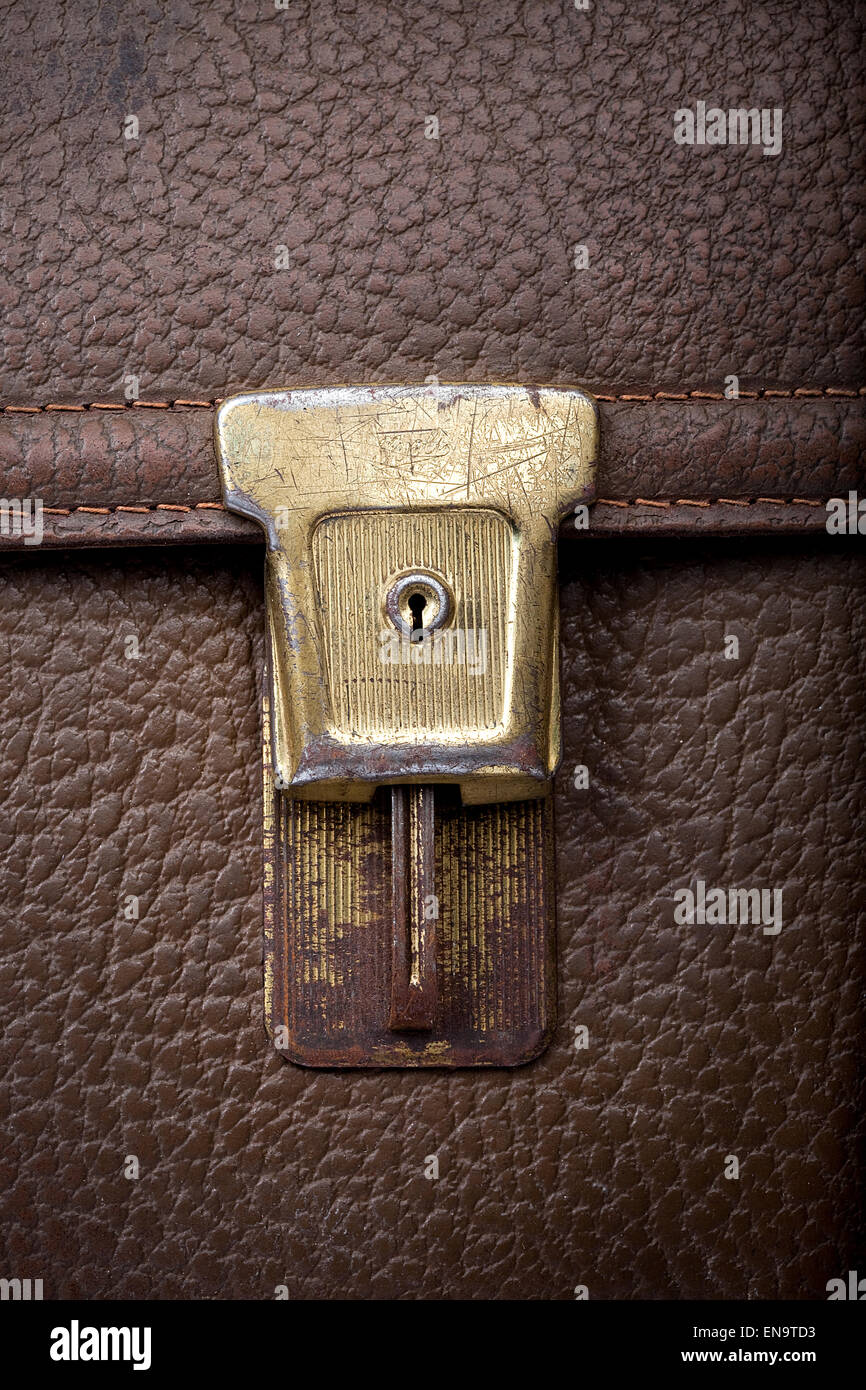 old scratchy lock of used leather shool bag, closeup Stock Photo