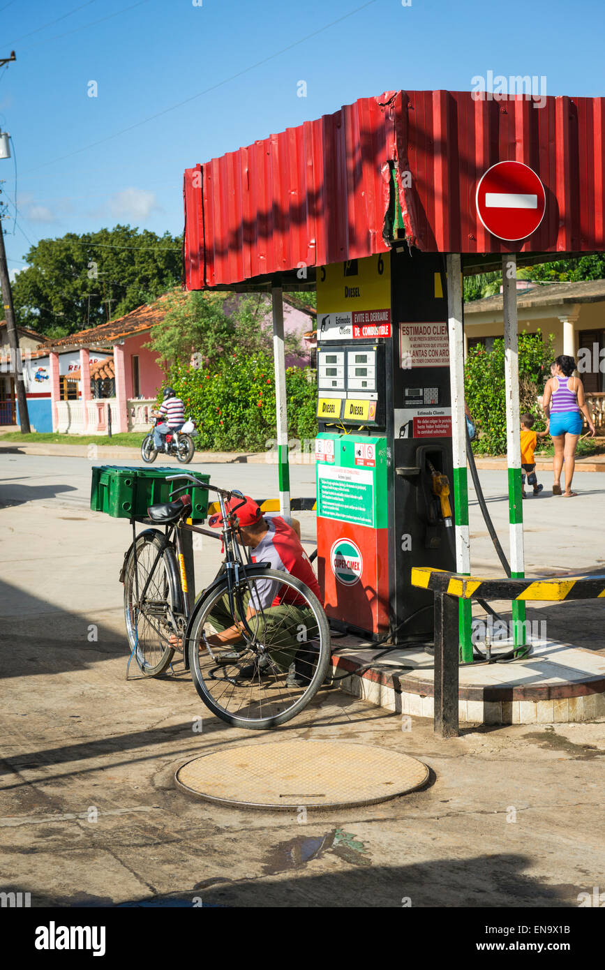 Cuba Vinales Calle Salvador Cisneros main street scene road service station garage petrol pump Cupet - Cimex bike inflate tyres Stock Photo